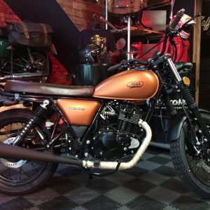 Mash Seventy 125cc in copper at Chas Mann Motorcycles side view